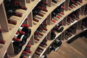 Downstairs and wine bottles in a winery